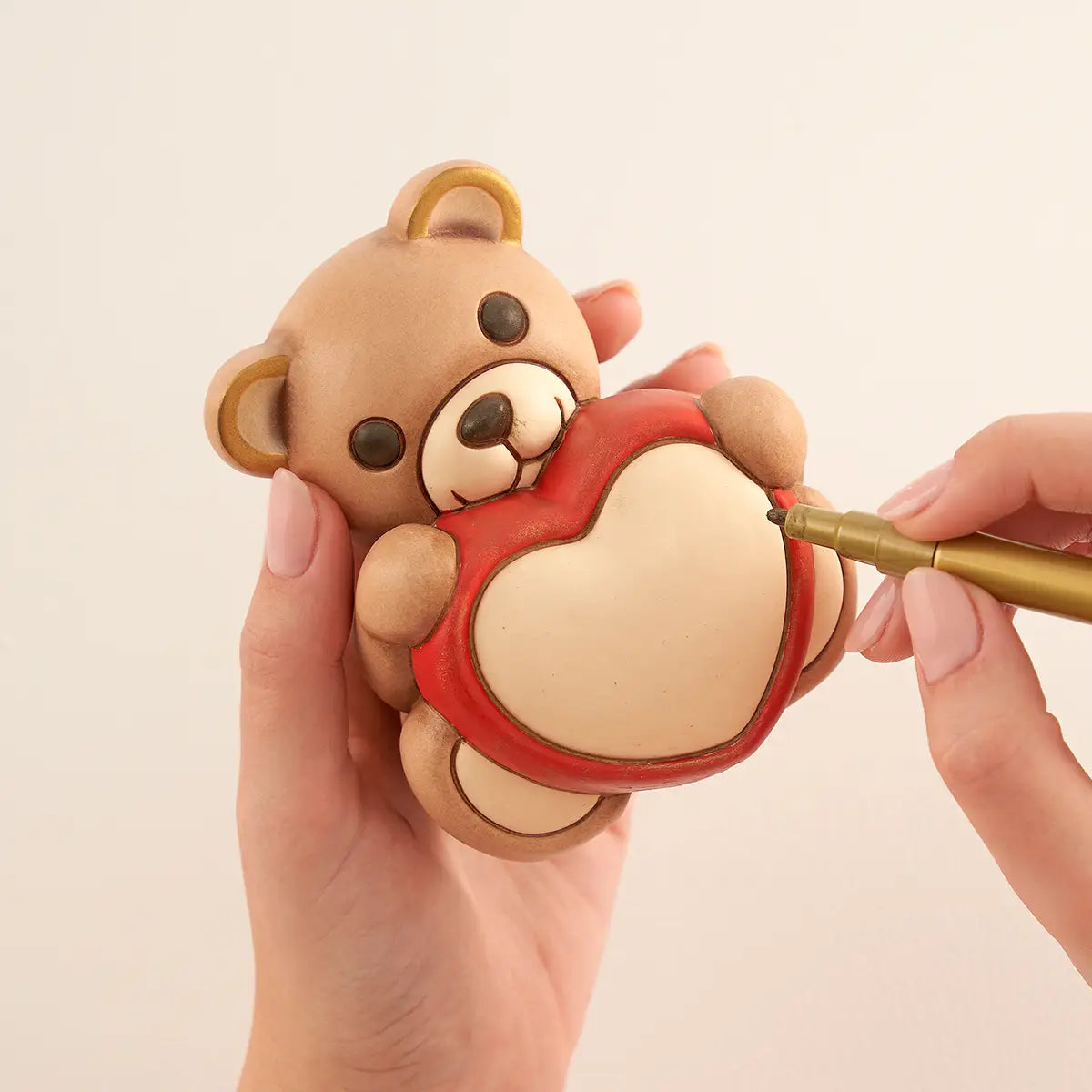 Teddy con cuore in ceramica, medio
