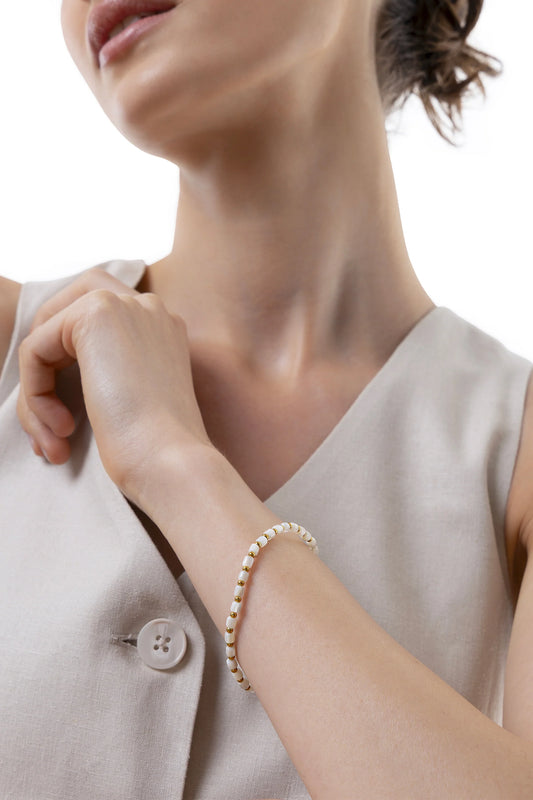 BRACCIALE ELASTICO CILINDRI SFERE