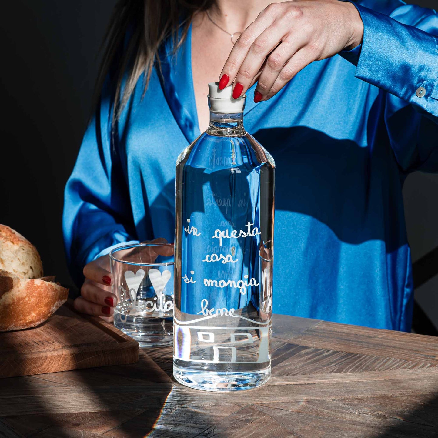 Bottiglia In questa casa si mangia bene